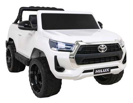 Toyota Hilux na akumulator dla dzieci Biały Pickup + Napęd 4x4 + Pilot + 2 bagażniki
