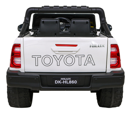 Toyota Hilux na akumulator dla dzieci Biały Pickup + Napęd 4x4 + Pilot + 2 bagażniki